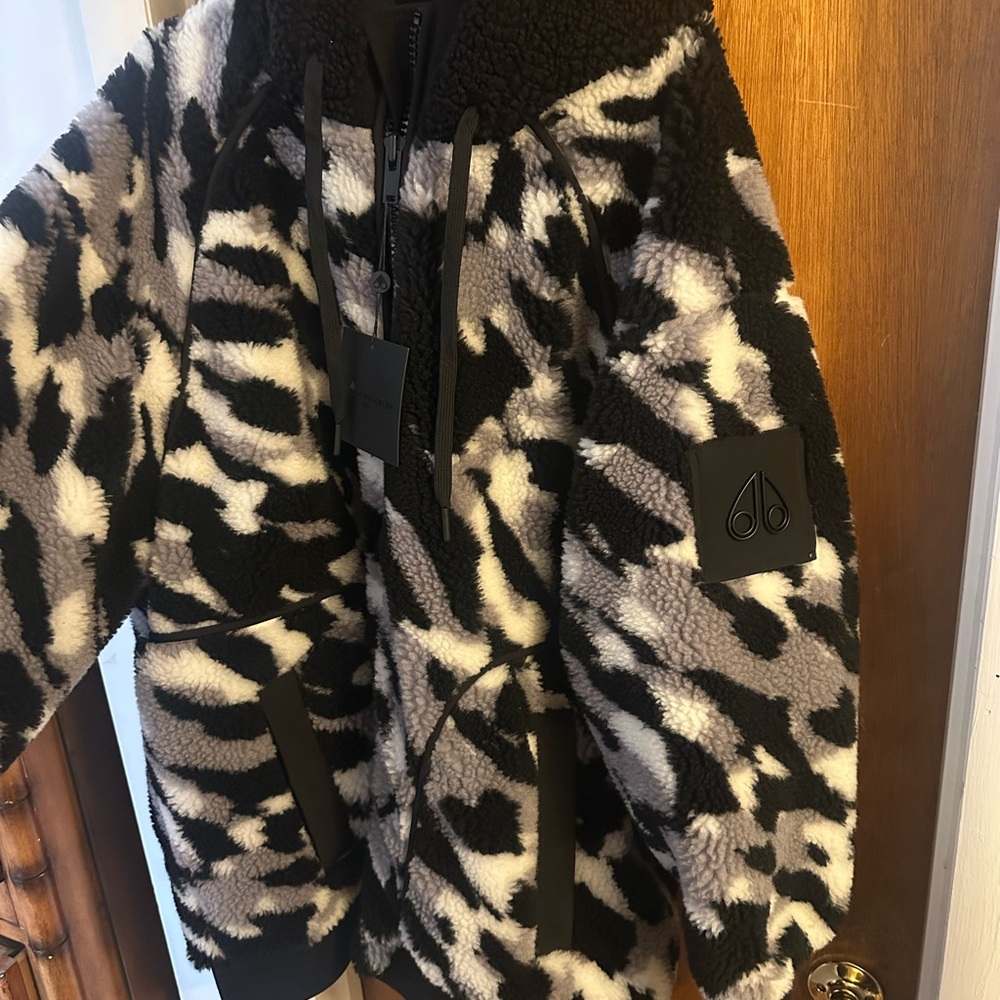 Moose Knuckles Black and White Patterned Bomber Jacket with a hood